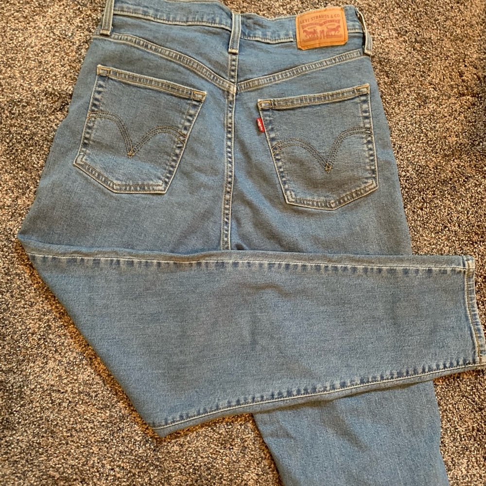 Levi mom jeans. High waist with tapered ankle fit
